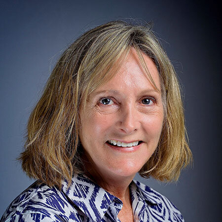 woman smiling shorter hair